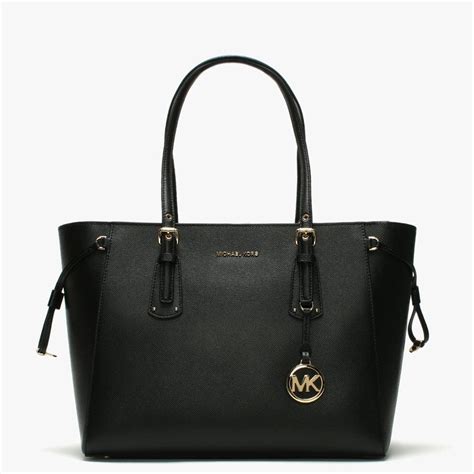 michael kors purse black|michael kors black tote purse.